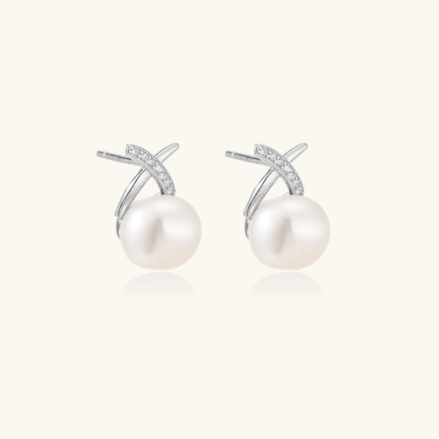 Rhodium plated sterling silver and freshwater pearl stud earrings