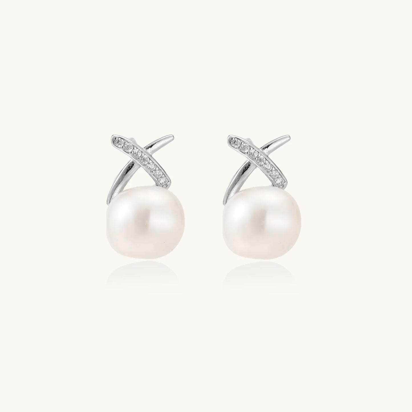 Rhodium plated sterling silver and freshwater pearl stud earrings